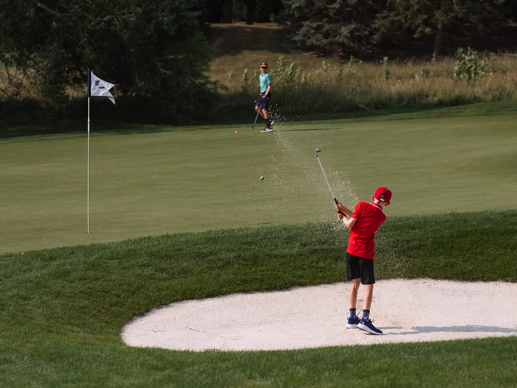 Naperville IL | Sports Photographer | Golf | Boy Playing Out of Sand Trap